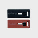 Lock Nest Slide Duo Primary Backup zestaw dwóch etui w kolorze czarnym primary i czerwonym backup. Pełna ochrona dla Twoich kluczy sprzętowych YubiKey